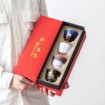 four assorted japanese style porcelain tea cups in gift box with auspicious motifs 2.5oz
