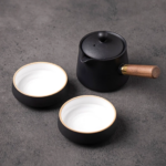 full view of 6.4oz matte black ceramic japanese portable travel tea set with 2 teacups