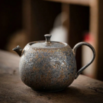 handcrafted japanese teapot iron rust glaze overall view