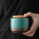 handheld japanese crackle glaze ceramic loose tea canister blue green brown with wood lid