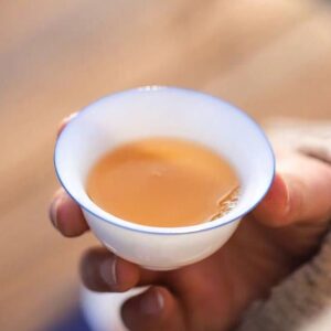 collection of different styles of japanese white porcelain japanese tea cup with blue rim
