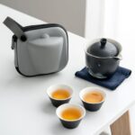 Portable Japanese Wabi-Sabi travel tea set 6.8oz with black ceramic teapot and protective travel case