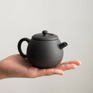 handcrafted japanese volcanic rock clay teapot matte black