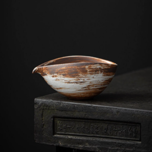 Japanese wabi-sabi handcrafted ceramic fairness cup front view