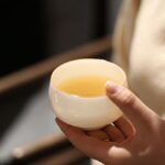 japanese white porcelain gold rim tea cup full product view