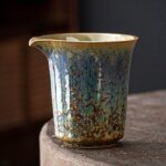 handmade kiln transformed ceramic japanese fairness cup tea pitcher main view