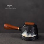 black ceramic kyusu teapot with mountain bird art front view