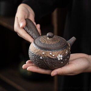 Handcrafted Japanese Kyusu Teapot with infuser and matching textured tray, silver floral decor