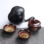 Portable Japanese kiln change glaze travel tea set complete with gaiwan two teacups and carry bag