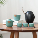 portable japanese travel tea set sage green kaolin clay with wood accents