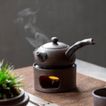 full set view of rustic japanese kyusu teapot with candle warmer