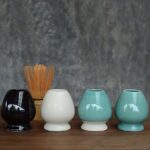 side view of blue ceramic japanese matcha chasen holder naoshi