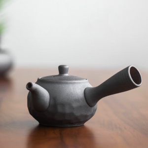full product shot of textured dark gray ceramic kyusu teapot