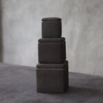 set of three dark grey japanese tea canister ceramic canisters stacked