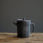 vintage japanese black ceramic teapot 5oz with built-in infuser main view
