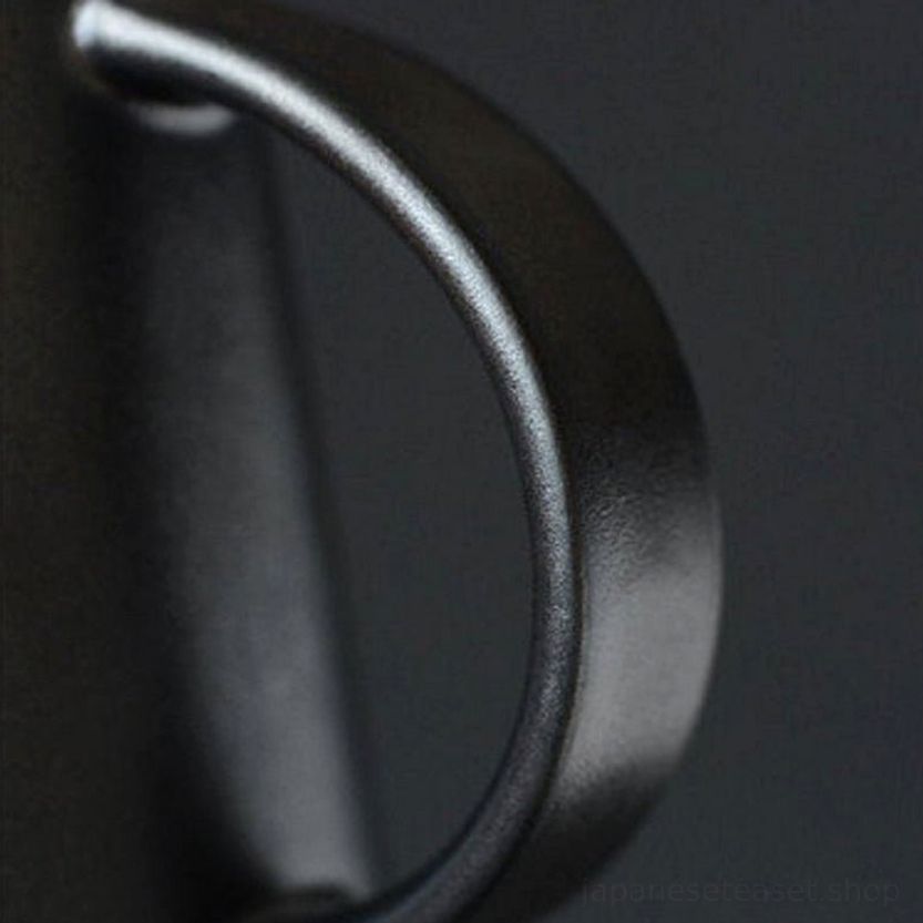 close up of built in filter holes inside vintage japanese clay teapot