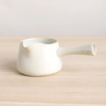 vintage white japanese ceramic fairness cup gong dao bei side view