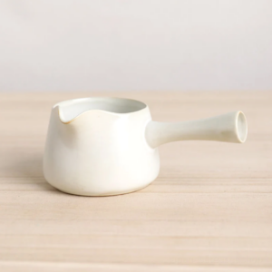 vintage white japanese ceramic fairness cup gong dao bei side view