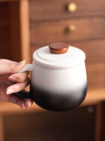 white and black gradient loose leaf tea infuser mug with ceramic strainer and wood lid knob