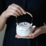 white japanese wabi-sabi ceramic japanese teapot with jute wrapped handle